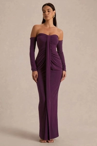 Detail view of deep purple off-shoulder dress featuring pleated fabric and elegant drape