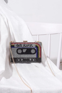 Detail of vintage cassette tape clutch with 80s Rock crystals and gold chain strap