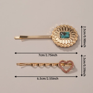 Detail showing dimensions of gold alloy hair clips with turquoise and pink heart rhinestones
