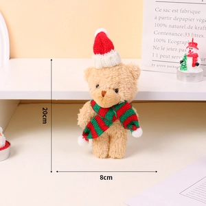 Detail view of 20cm plush Christmas brown bear doll with festive hat and striped scarf