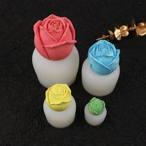 Detailed view of translucent silicone rose molds and colorful floral ice cubes