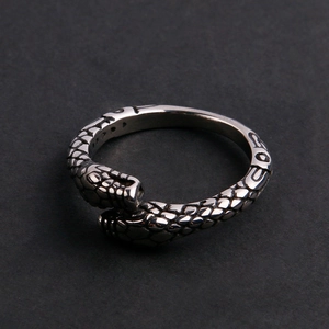 Vintage stainless steel snake ring with detailed scale texture and adjustable open band