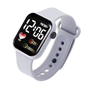 Detail view of square LED digital watch showing heart rate, calories, and step tracking data