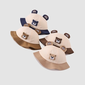 Set of cute baby cartoon bear bucket hats in assorted neutral colors for toddlers