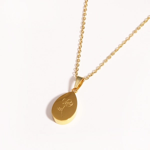 Collier en acier inoxydable doré avec pendentif goutte d'eau et gravure florale élégante
