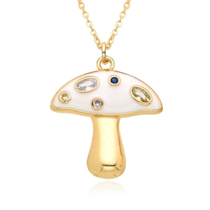 Golden mushroom pendant necklace with colorful zircons and white enamel on a white background