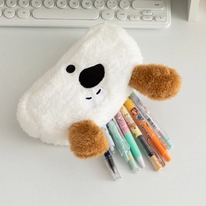 Close-up of a plush white puppy pencil case with large capacity holding several pens