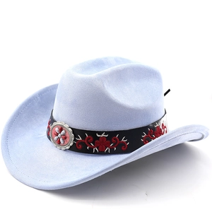 Detail of light blue suede cowboy hat with floral embroidery and vintage concho buckle