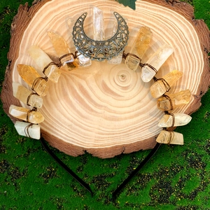 Handmade citrine and white crystal crown headband with a metal moon on wood base