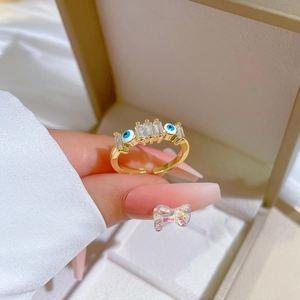 Gold plated evil eye ring with rectangular zircons and adjustable open band design