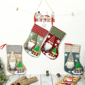 Linen and knit Christmas stockings with 3D gnomes for holiday gift bags and decorations