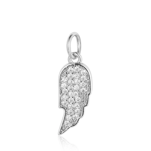 Macro detail of a silver wing-shaped pendant with sparkling clear zircon micro-pave