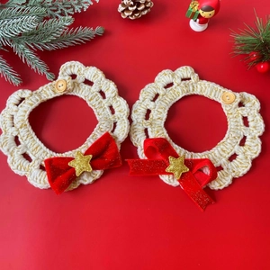 Handmade Christmas pet collar with red velvet bow and gold stars on white crochet scarf