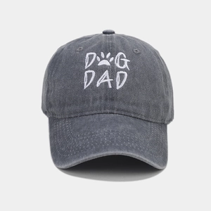 Detailed white DOG DAD embroidery on dark grey washed cotton baseball cap