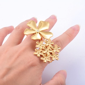Elegant gold titanium flower ring with zircon details in an adjustable open design