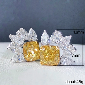 Luxury water drop earrings with yellow zircon centers and sparkling floral lace borders