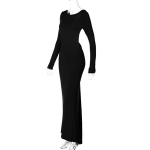 Detailed side view of a slim-fit black maxi dress with long sleeves and round neckline