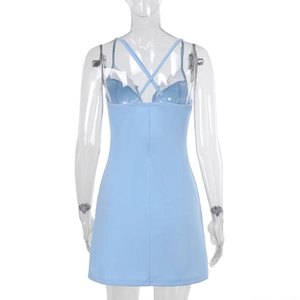Detailed back view showing cross straps and white lace trim on light blue mini dress