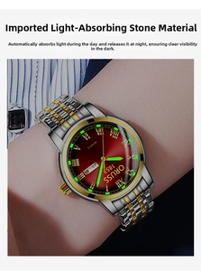 Close-up of ORUSS quartz watch with red gradient dial and luminous hands on wrist