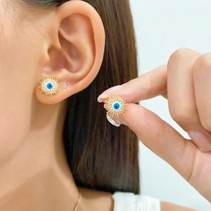 Goldenes Sonnen-Schmuckset mit blauen bösen Augen Charms und Kristallen für Damen