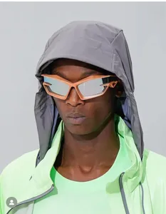 Cyberpunk cat-eye sunglasses with orange geometric frame and silver mirrored lenses