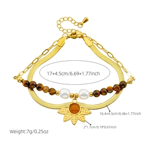 Double-layered gold stainless steel chain bracelet with tiger eye beads and leaf pendant