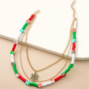 Detail of Christmas multi-layer necklace with snowman, snowflake and polymer clay beads