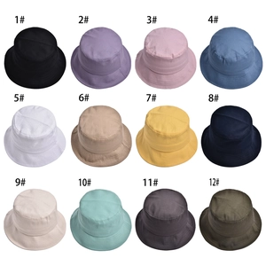 Classic cotton sun protection bucket hats in twelve colors with a flat top design