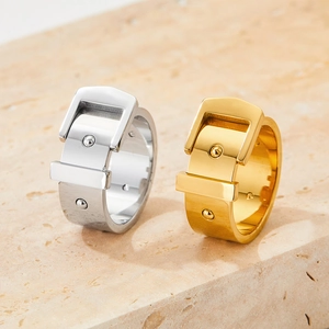 Belt buckle style stainless steel rings in gold and silver finish on stone