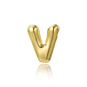 Macro shot of 18K gold-plated letter V balloon pendant with a polished metallic finish