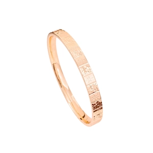 Rose gold metal ring featuring traditional mahjong motifs and a Chinese character