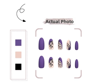 Detailed flat lay of purple and nude press-on nails with black leaf patterns and glitter