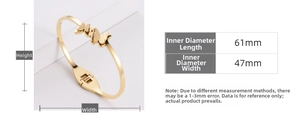 Detailed size chart of gold butterfly bangle with 61mm length and 47mm width dimensions