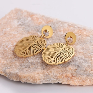 French vintage style gold hollow leaf earrings made of textured stainless steel