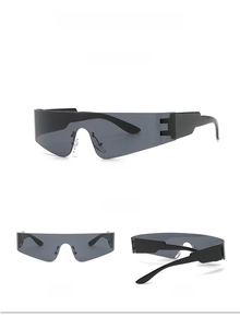 Dettaglio occhiali da sole shield neri con design senza cuciture e aste larghe