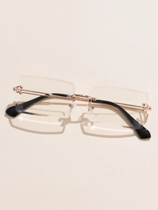 Top-down view of rimless square sunglasses with gold metal temples and black tips