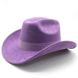 Detail of a purple suede western cowboy hat featuring classic ribbon trim and fine stitching