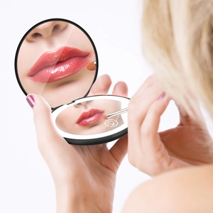 Portable black LED makeup mirror with folding dual-side design and dimmable light
