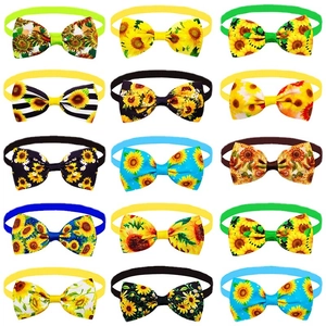 Set of 15 colorful sunflower print dog bowties with elastic straps for pet grooming