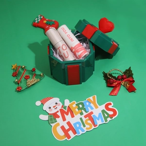 Lip mud makeup set in a festive Christmas gift box with green and red heart design