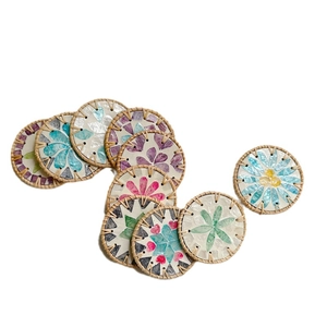 Handmade round rattan coasters with colorful shell flower patterns for heat insulation
