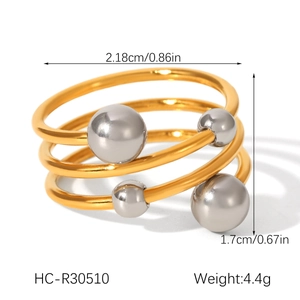 Detailed dimensions and weight of the three-layer gold and silver tone spiral ring