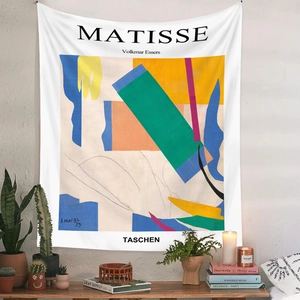 Detailed macro view of Henri Matisse style abstract art tapestry in a cozy home setting