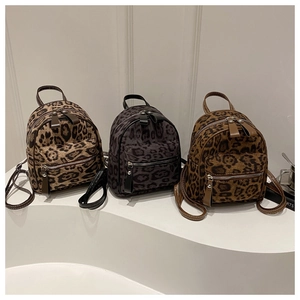 Detailed comparison of leopard print mini backpacks in light brown, grey and dark coffee