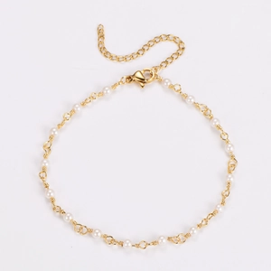 Detailed view of handmade baroque pearl bracelet with adjustable gold chain and lobster clasp