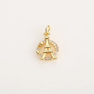 Close-up of golden Eiffel Tower pendant with zircon-studded ring and hanging loop