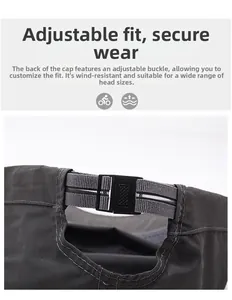 Detail of adjustable windproof buckle and elastic strap on grey quick-dry outdoor cap