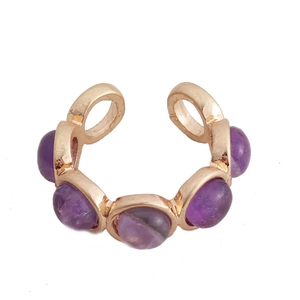 Bague ouverte en or rose avec cinq pierres cabochons violettes au design tendance