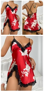 Detail of red floral ice silk nightgown with black lace trim and sexy side slit design