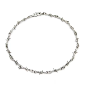 Unisex silver thorn barbed wire necklace in punk hip-hop style on white background